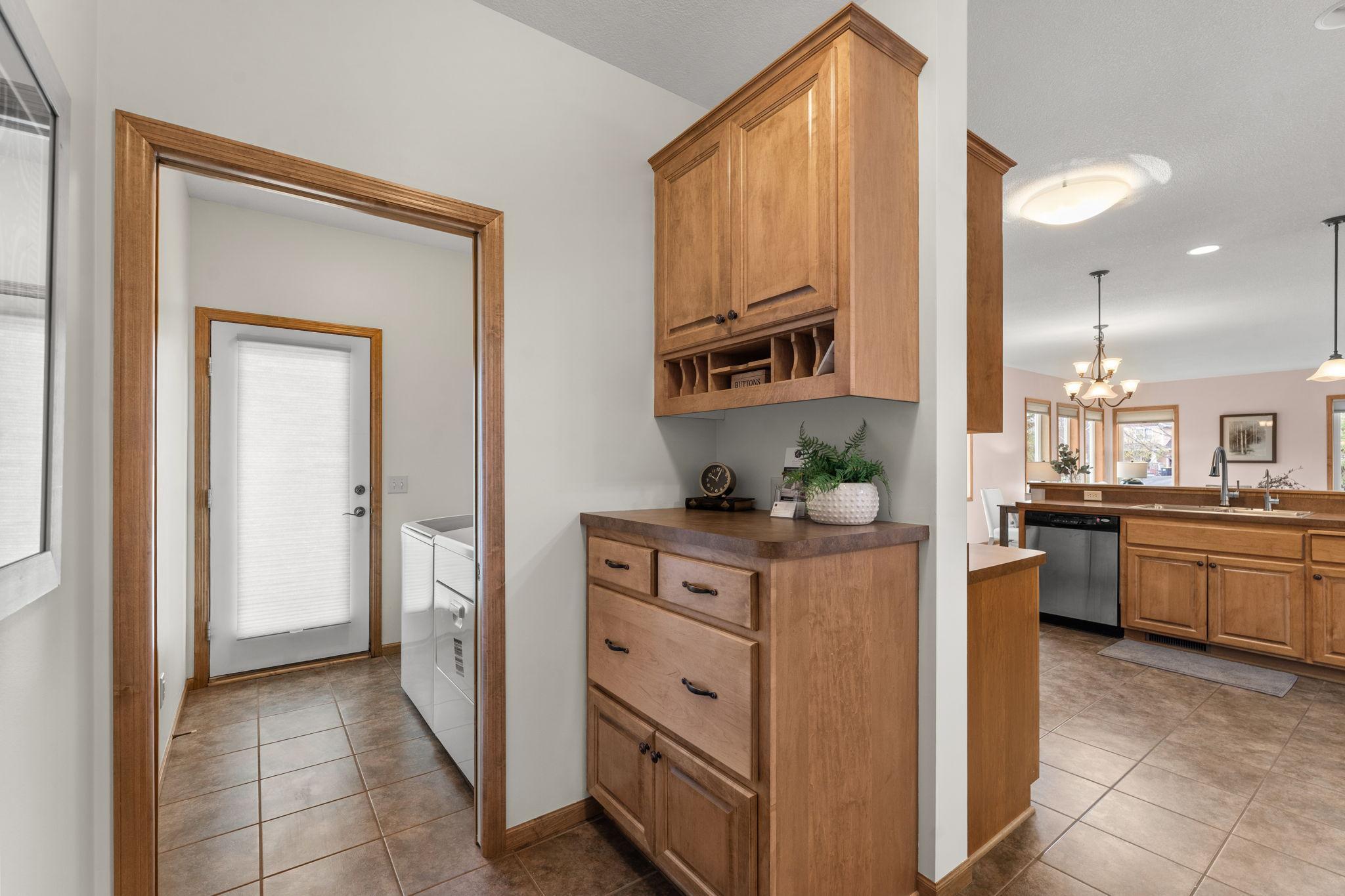 Another view of the laundry room from the attached garage entryway.