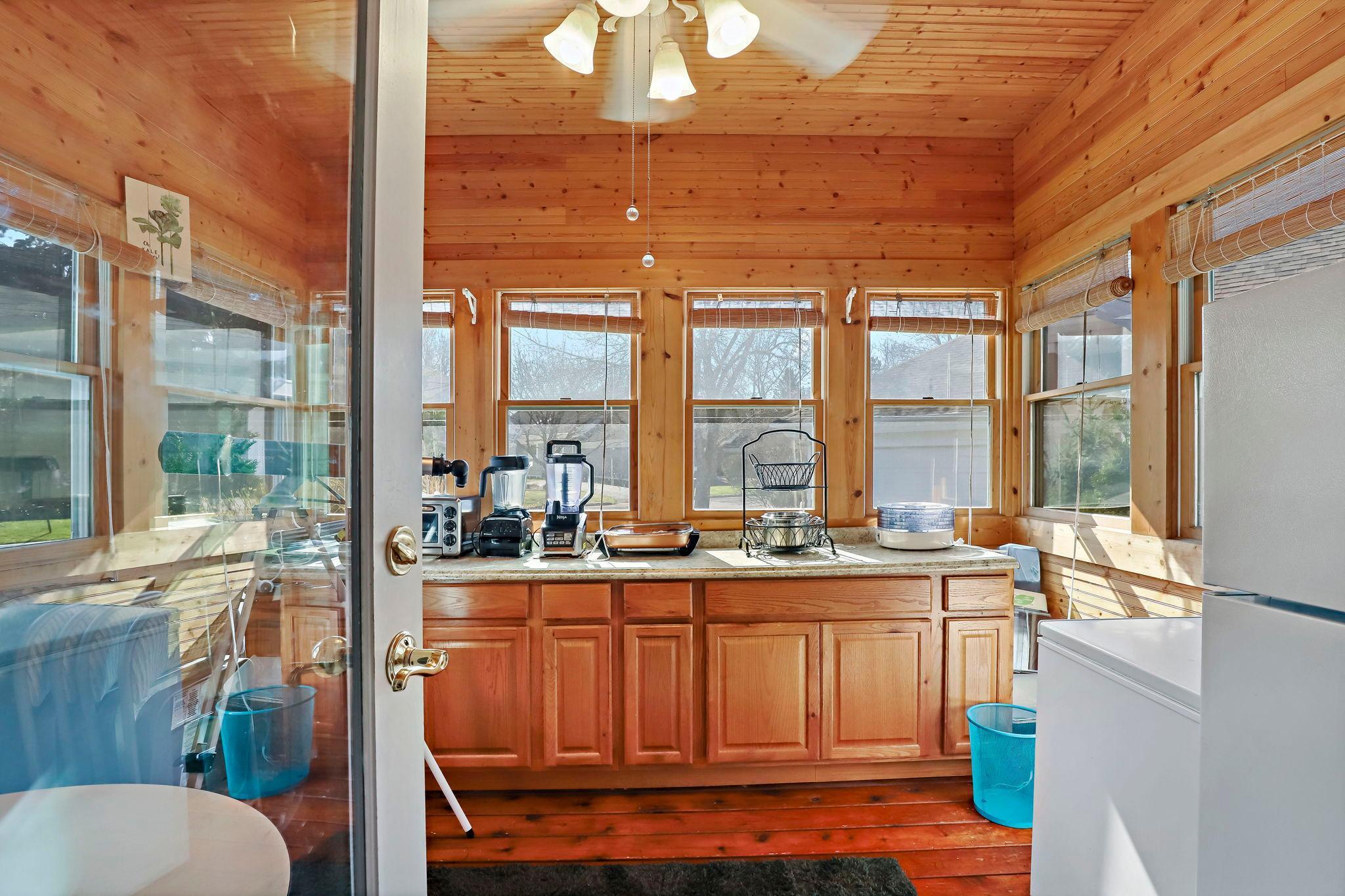 Porch is currently being used as a butler pantry for extensive entertaining..513 Willdflower, BV.