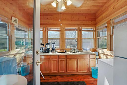 Porch is currently being used as a butler pantry for extensive entertaining..513 Willdflower, BV.