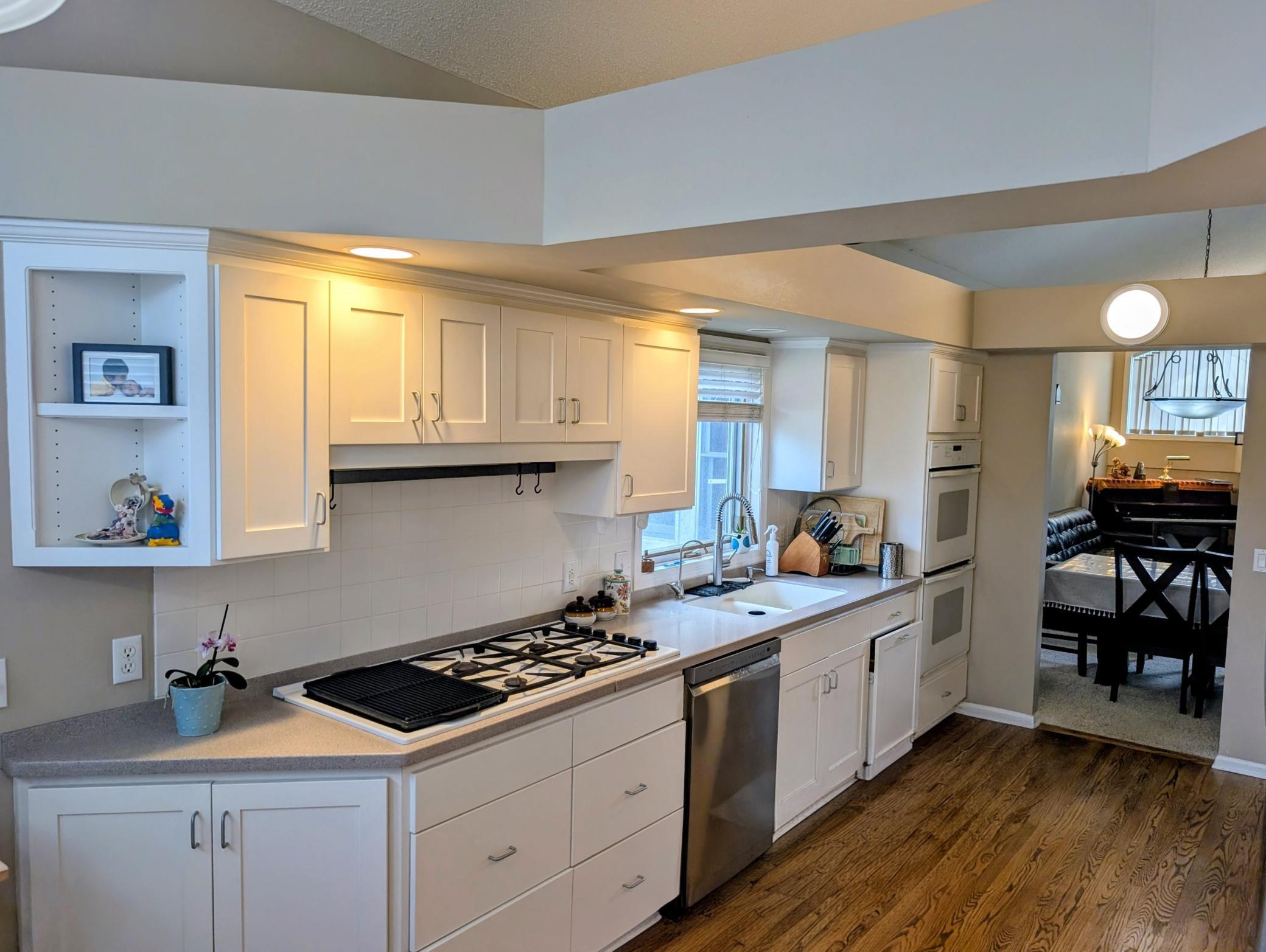 Great working kitchen with corian counters & sink.