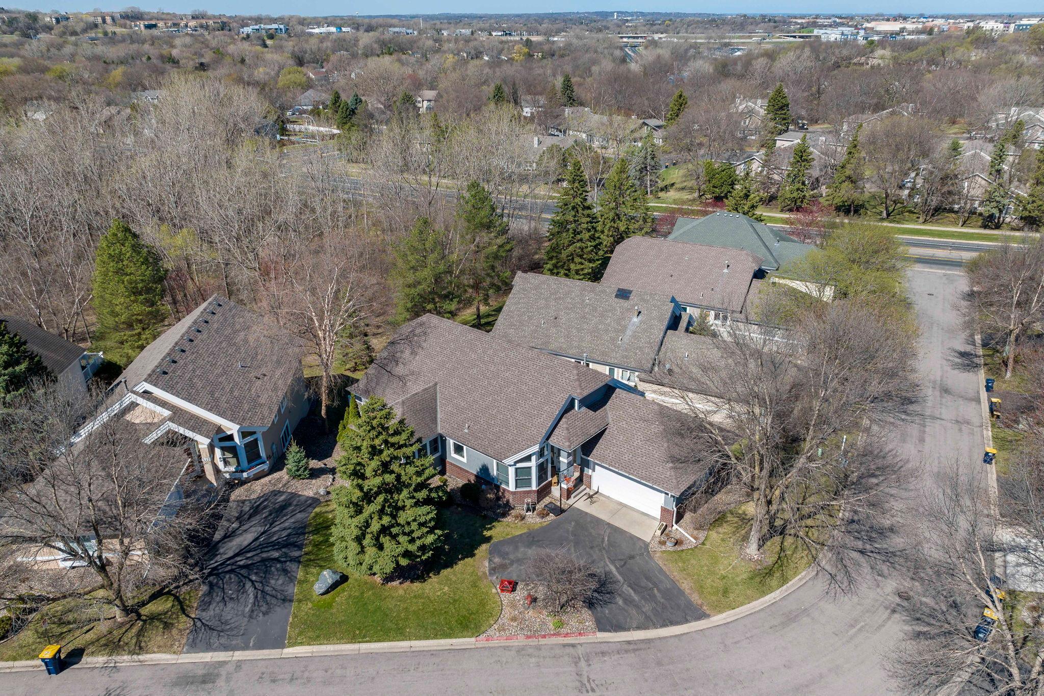 Picturesque setting on a curve with an additional parking area in front.