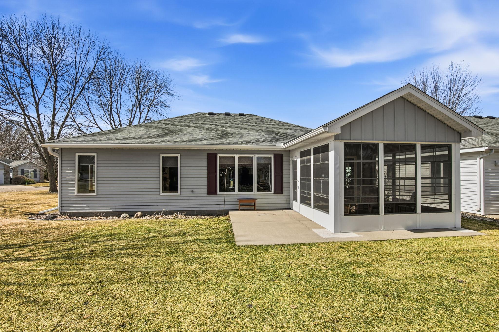 Back view showing new porch and outside patio