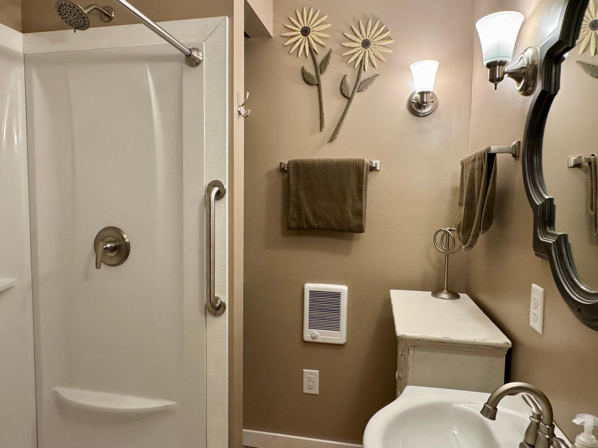 Main level 3/4 bathroom with shower