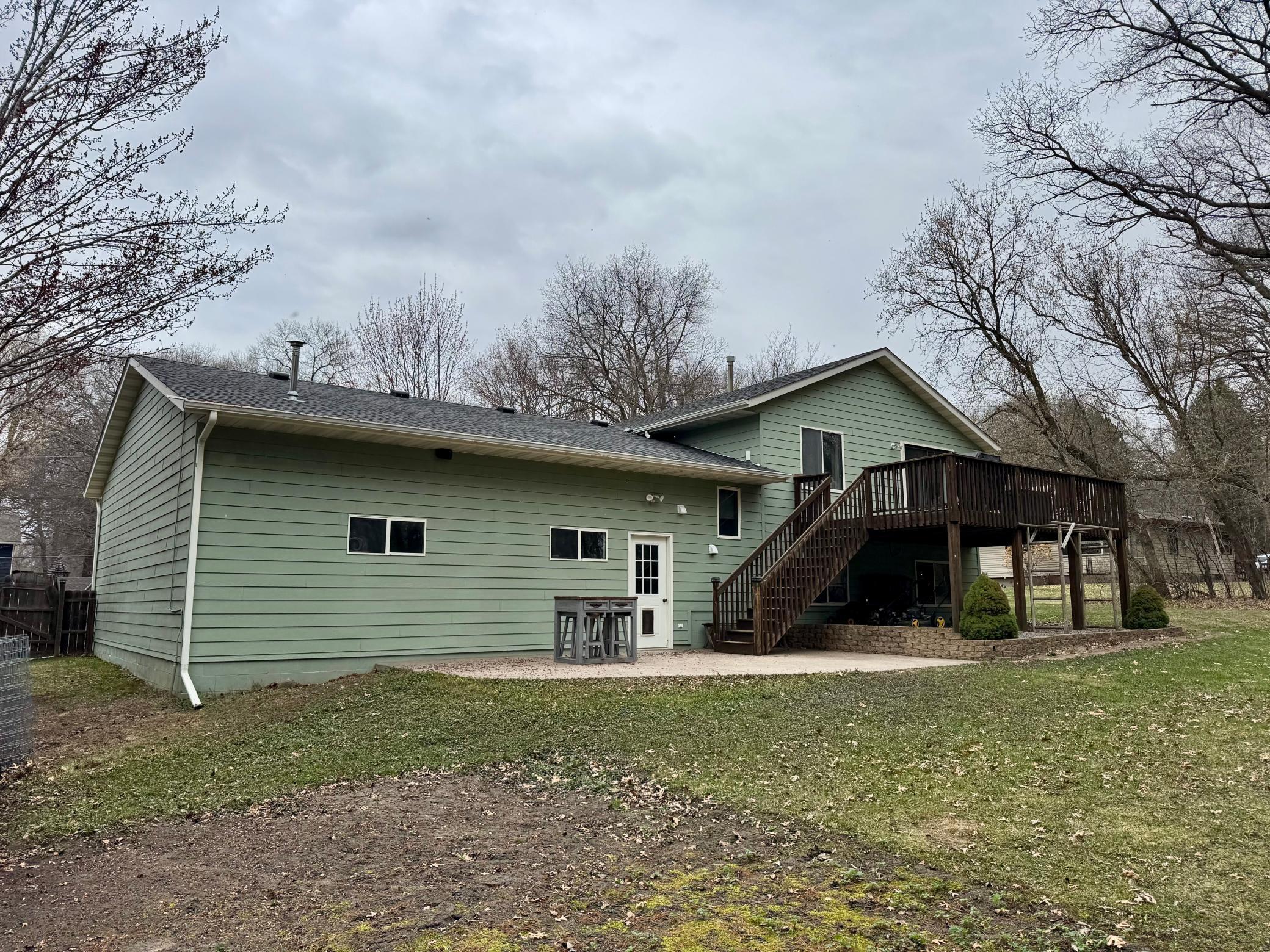 Rear view of patio and deck