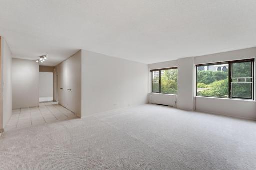 Large windows let in the light and offers view of the outside patio and pool