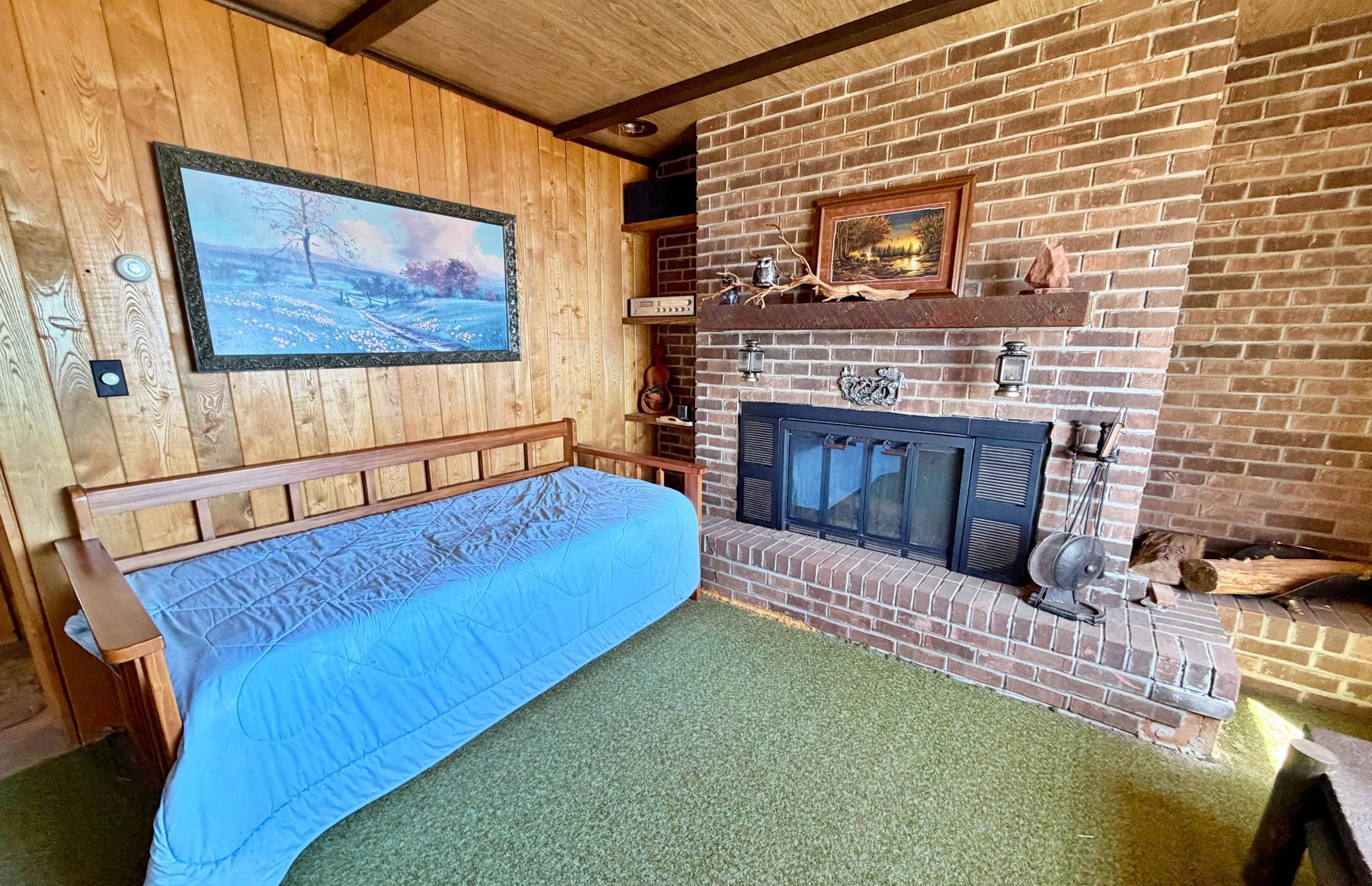 Living room with brick fireplace.jpg