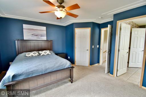 Primary bedroom with walk in closet and walk through full bath