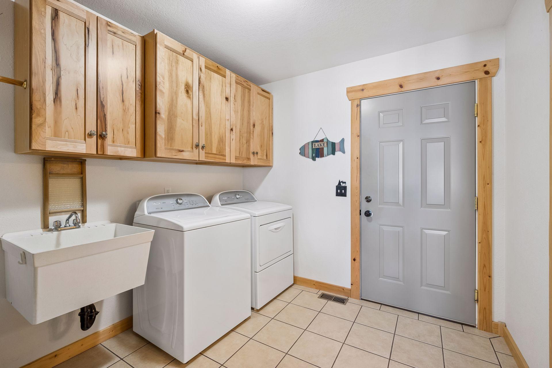 Main level laundry and drop zone off the garage back entry from garage.