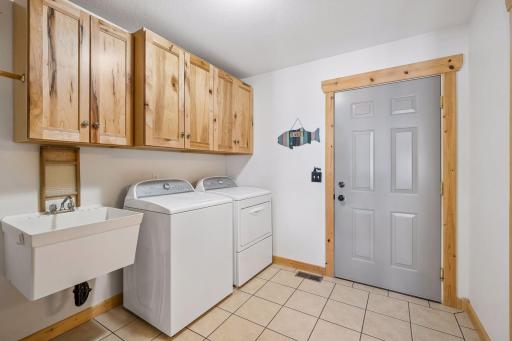Main level laundry and drop zone off the garage back entry.