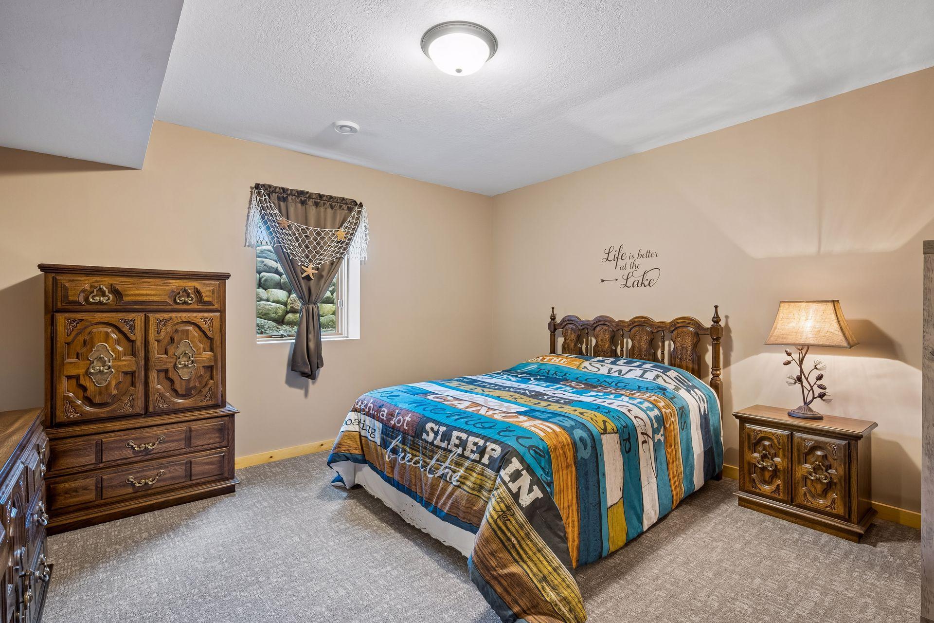 4th bedroom in lower level is spacious to accommodate guests and family.