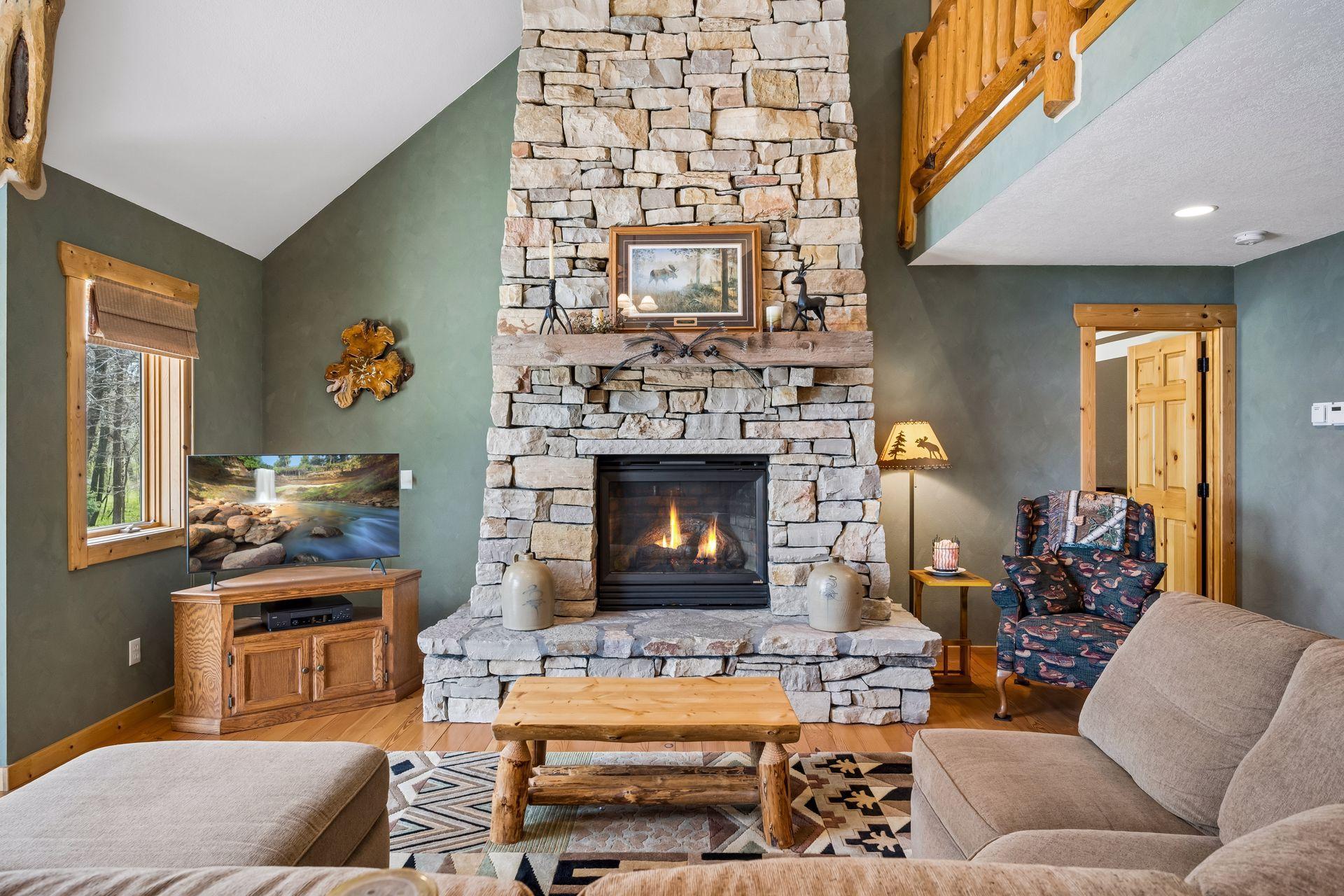 Perfect spot to gather for all guests or family to relax, read a book, visit or watch TV and cozy up next to your gas fireplace.