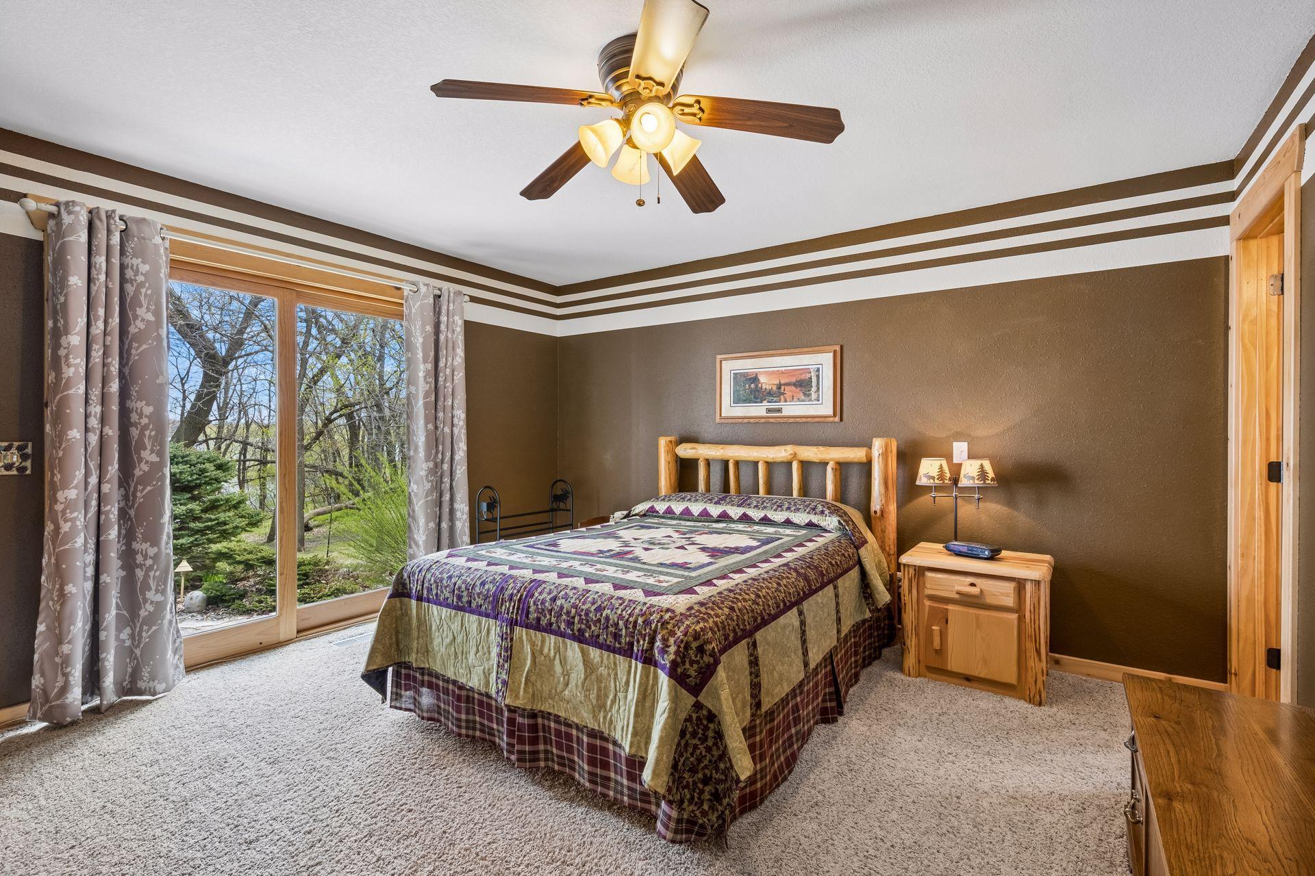 ML primary suite with your own slider to walk out to the back patio.