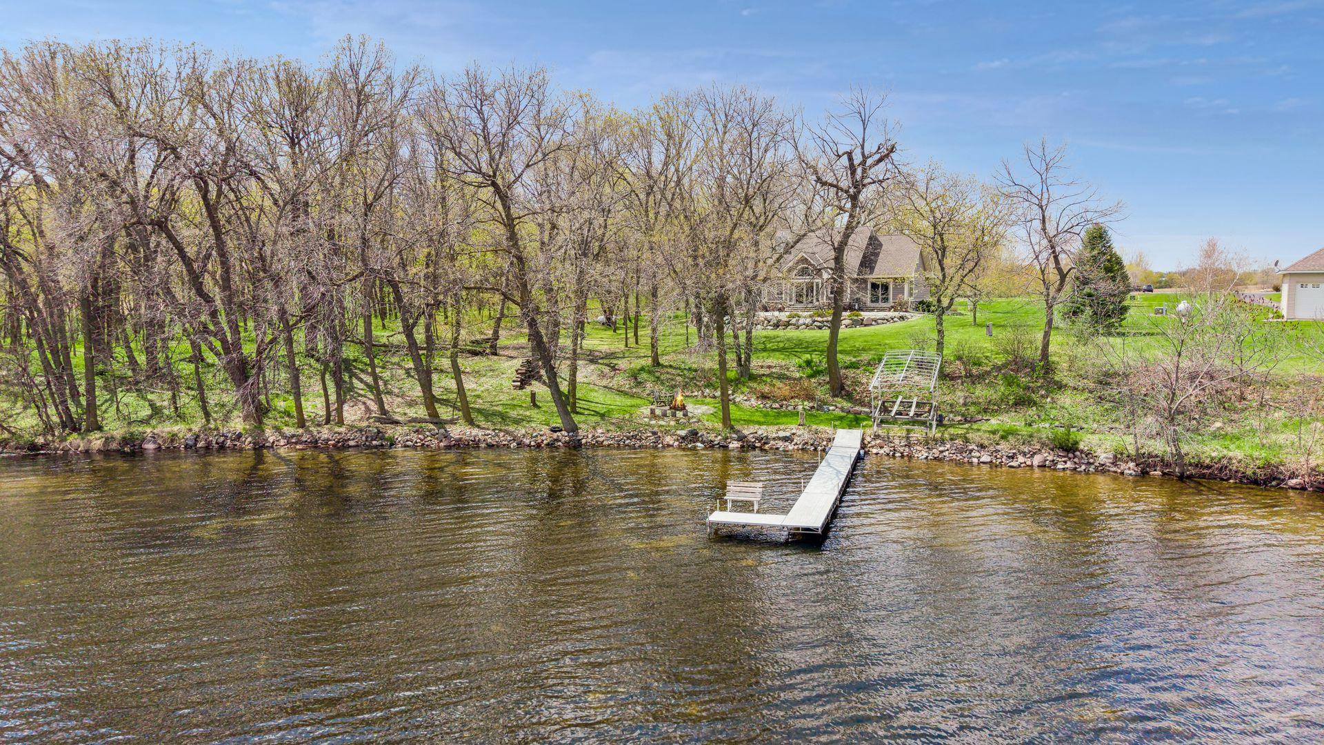 Escape to peaceful lakeside living in this beautiful Dassel retreat on Collinwood Lake. Towering trees, sparkling water views, a private dock, and cozy firepit. Enjoy relaxing mornings, sunset evenings as perfect blend of privacy and waterfront charm
