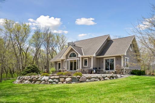 Back of home has so many windows to enjoy the water views and privacy.