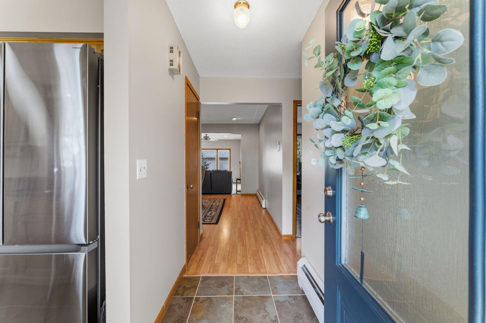 Welcoming Front Entryway with Coat Closet