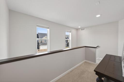 This end unit features plenty of windows!