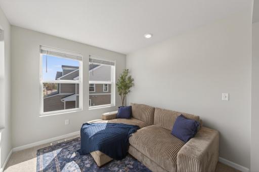 Sun room bump out allows for this awesome owner's retreat in the primary bedroom.
