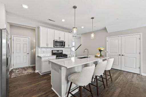 Large kitchen island with plenty of surface space for cooking.