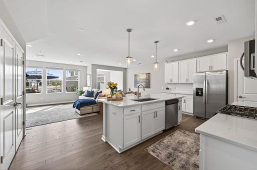 Open-concept floor plan with gorgeous LVP flooring throughout.