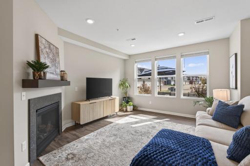 Large windows allow ample natural light to flood in.