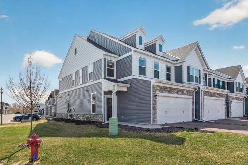 End unit on the corner of 94th provides additional greenspace around the home!