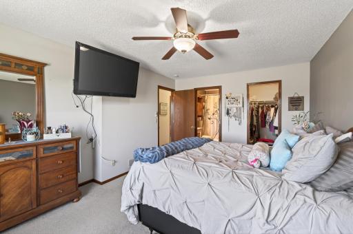 The primary bedroom also has a walk-in closet and private full bath.