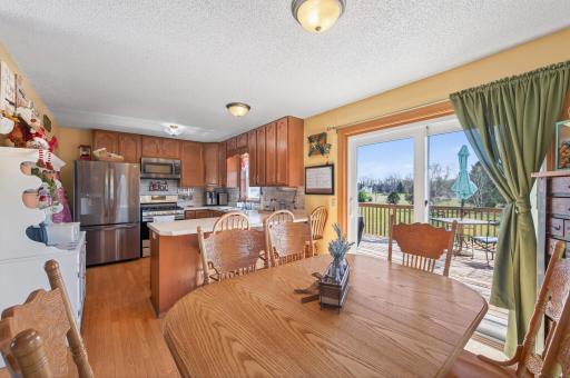 Walk out to the deck overlooking the beautiful acreage for easy indoor-outdoor living.