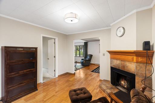 Another angle of the living room showing it's connection to the entryway sunroom.