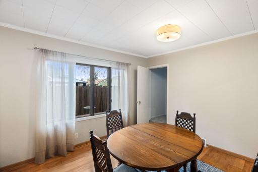 The dining area has a large window that brings in so much light!