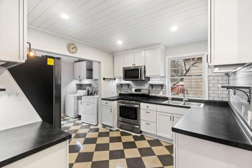 The updated kitchen is spacious and comfortable