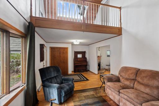 The entryway is includes an amazing loft and a skylight!
