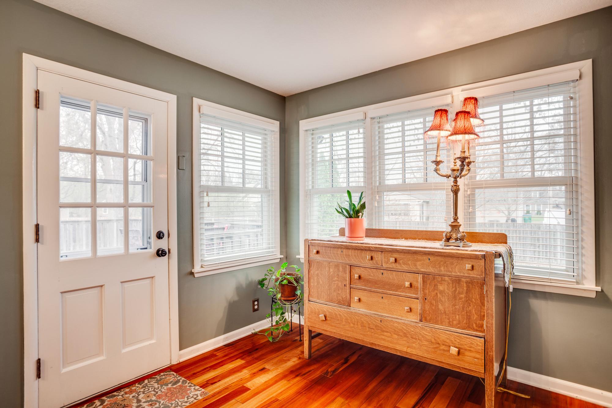 A sunny niche with direct access to the backyard deck, seamlessly blending indoor and outdoor living.