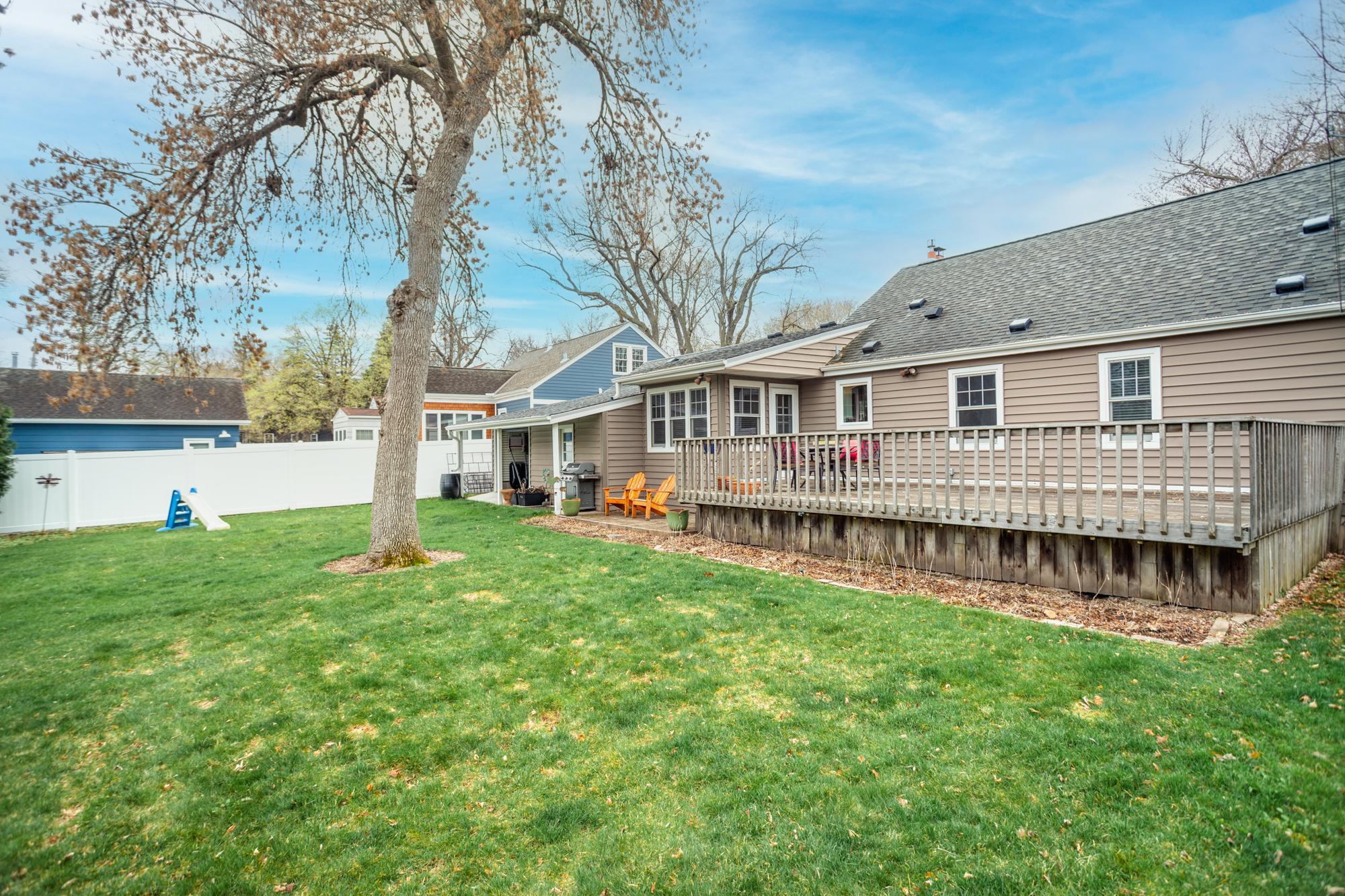 Fully fenced, the spacious backyard offers a great mix of open space and functionality. Flat, manicured lawn provides plenty of room for games, pets, or entertaining, all complemented by mature trees that add privacy and beauty.