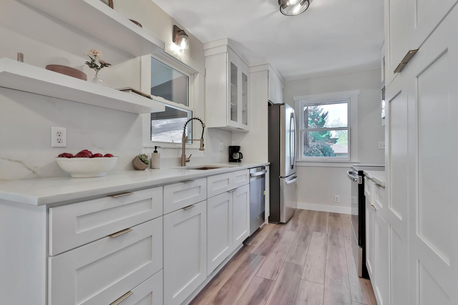 Brand New Kitchen with Quartz Countertops and Stainless Appliances