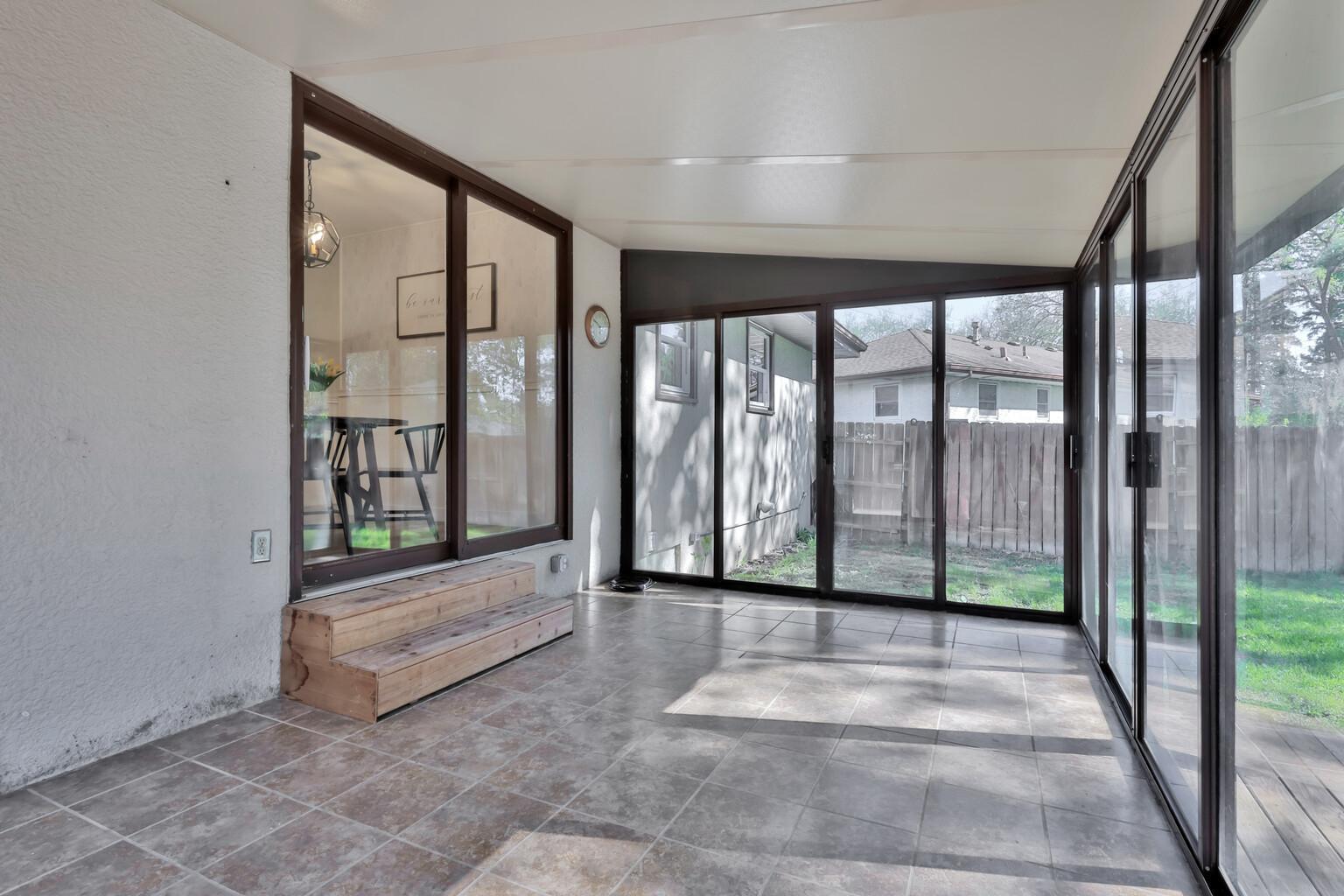 Full Glass Enclosed Porch off Dining Room
