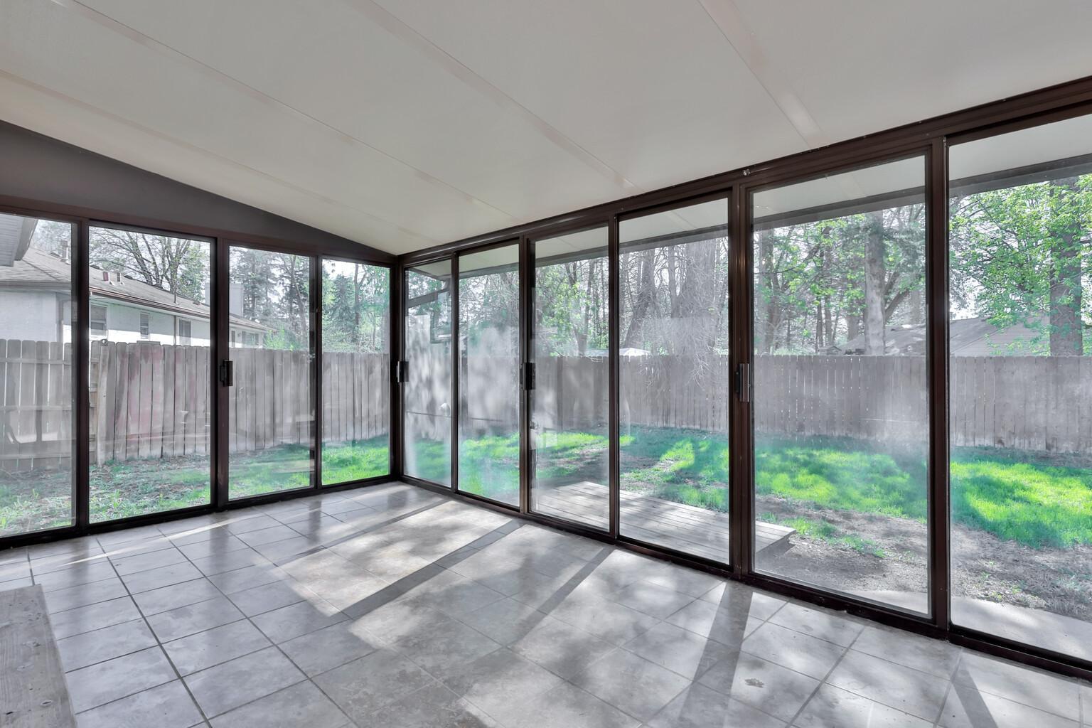 Full Glass Enclosed Porch off Dining Room