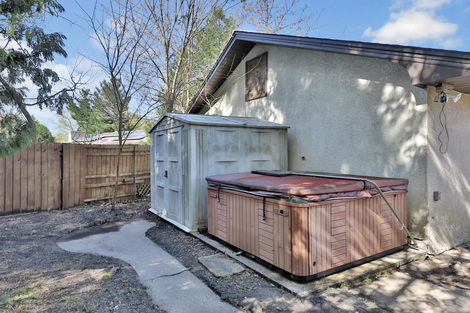 Storage Shed & Hot Tub included