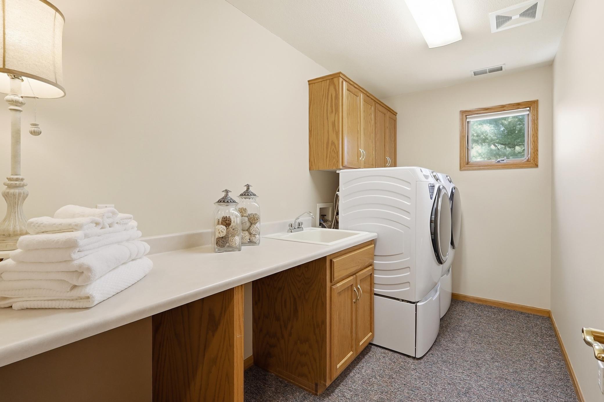 Large Laundry Room with LG machines on pedestals