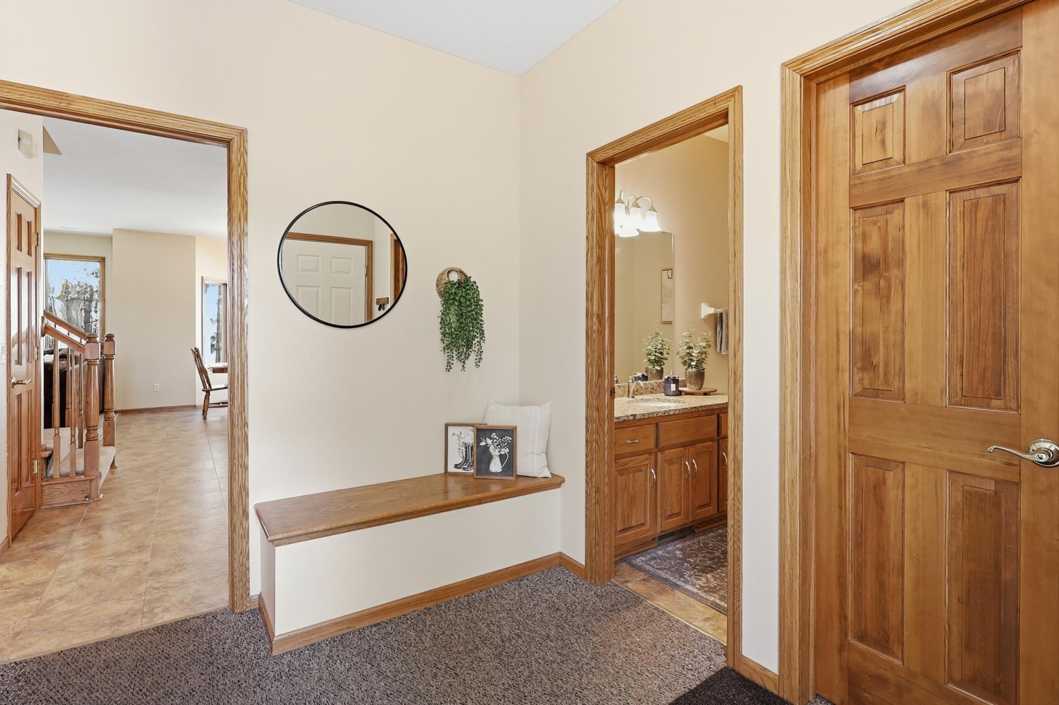 Mud Room Area with large half bath and walk in closet for storage!