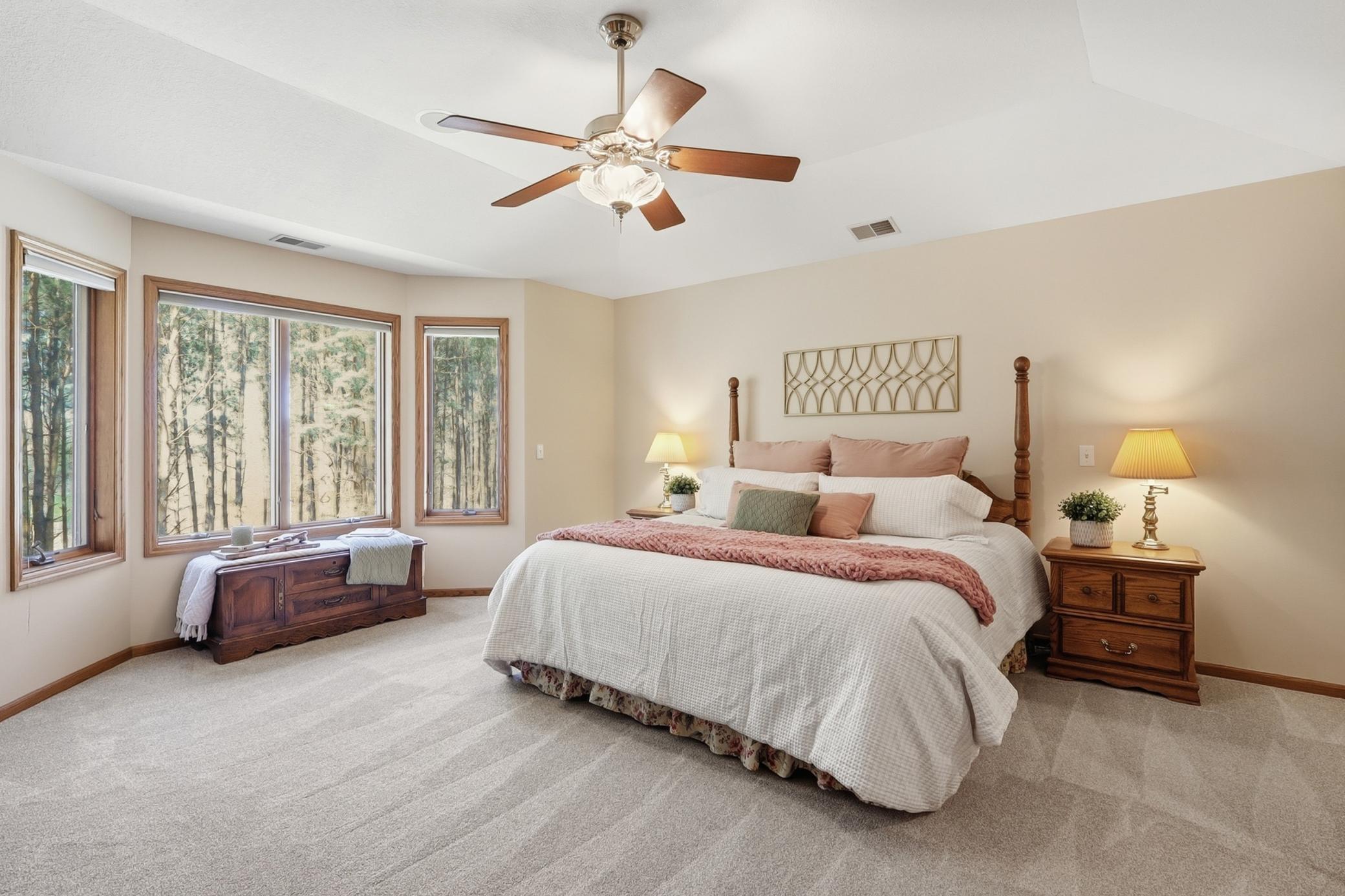 Primary Suite - a beautiful retreat with breathtaking views of your plot of nature