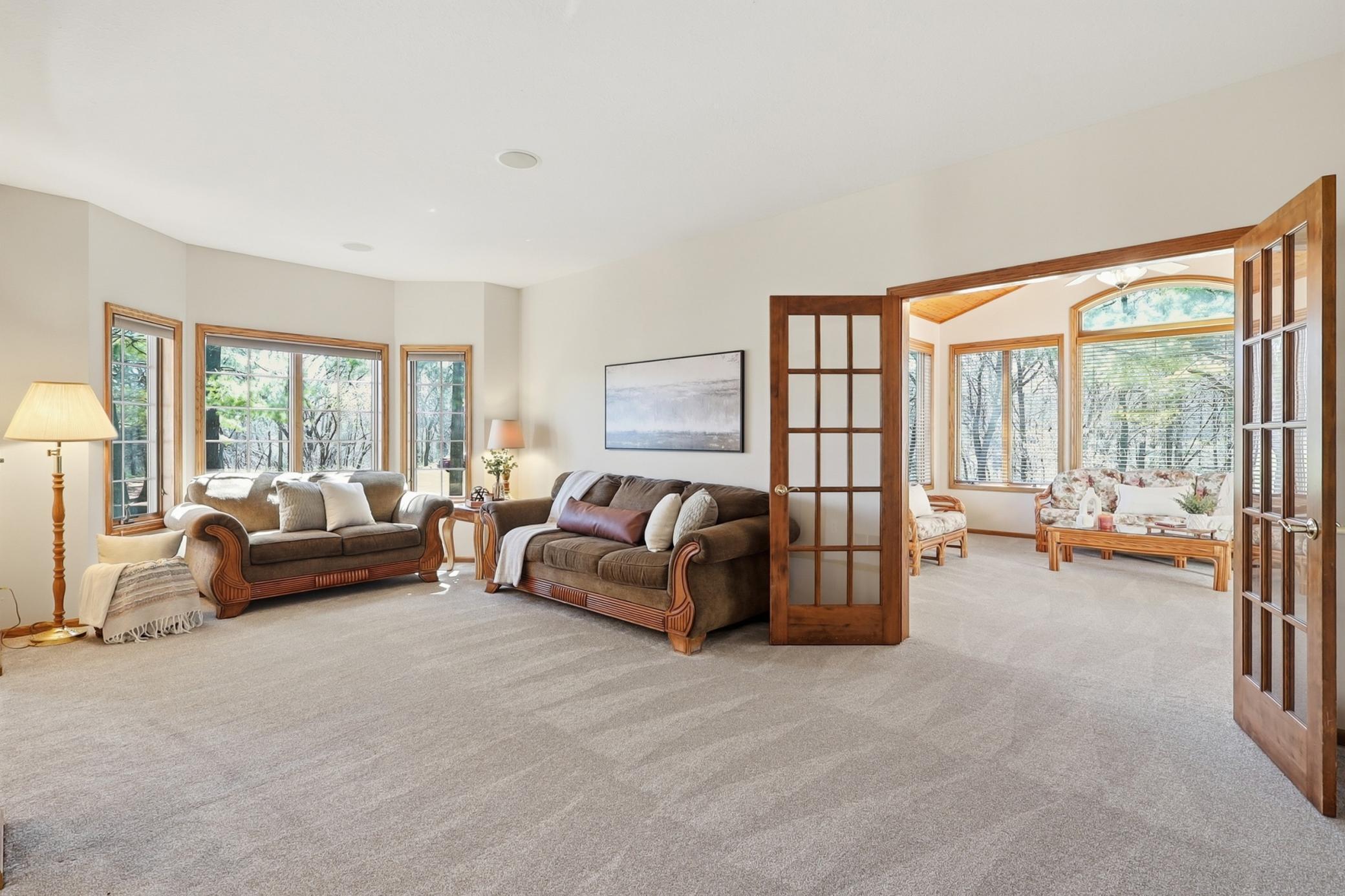 One of 4 sitting areas connecting to sun room