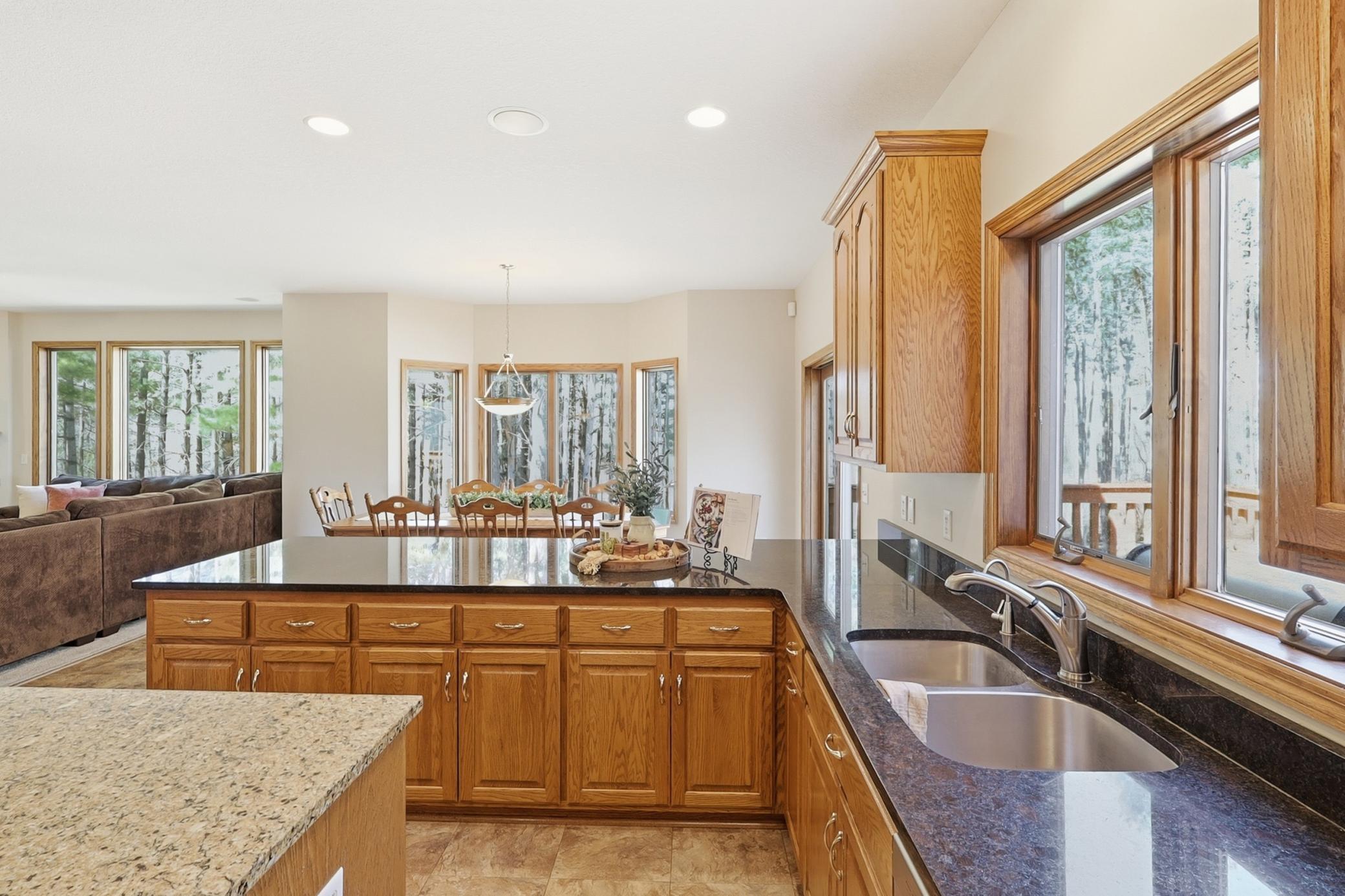 Coveted Window about kitchen sink and eat-in dining room