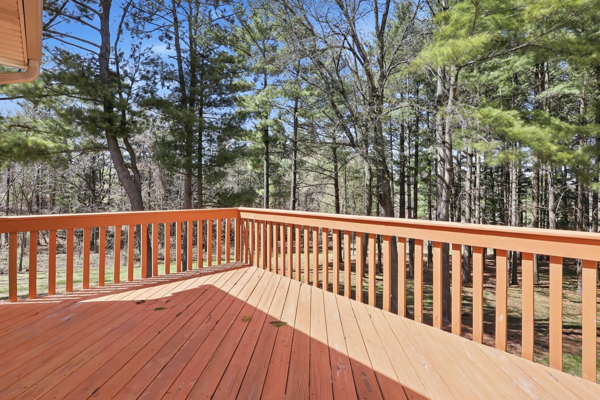 Deck overlooking backyard