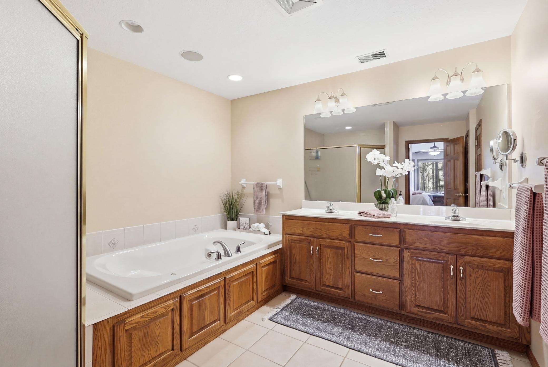Large Primary Bathroom with soking tub and Walk in Shower with Dual Shower heads!
