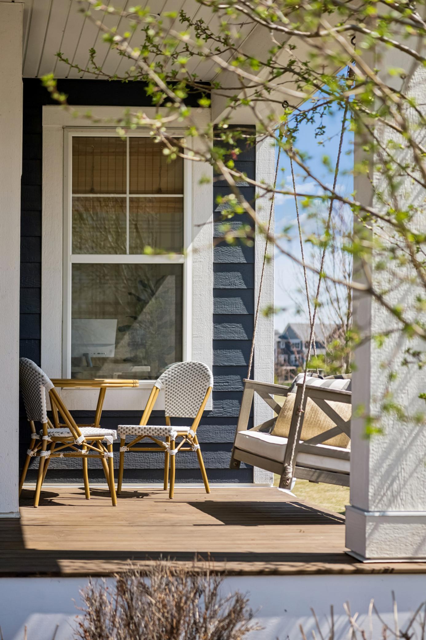 Front porch complete with swing