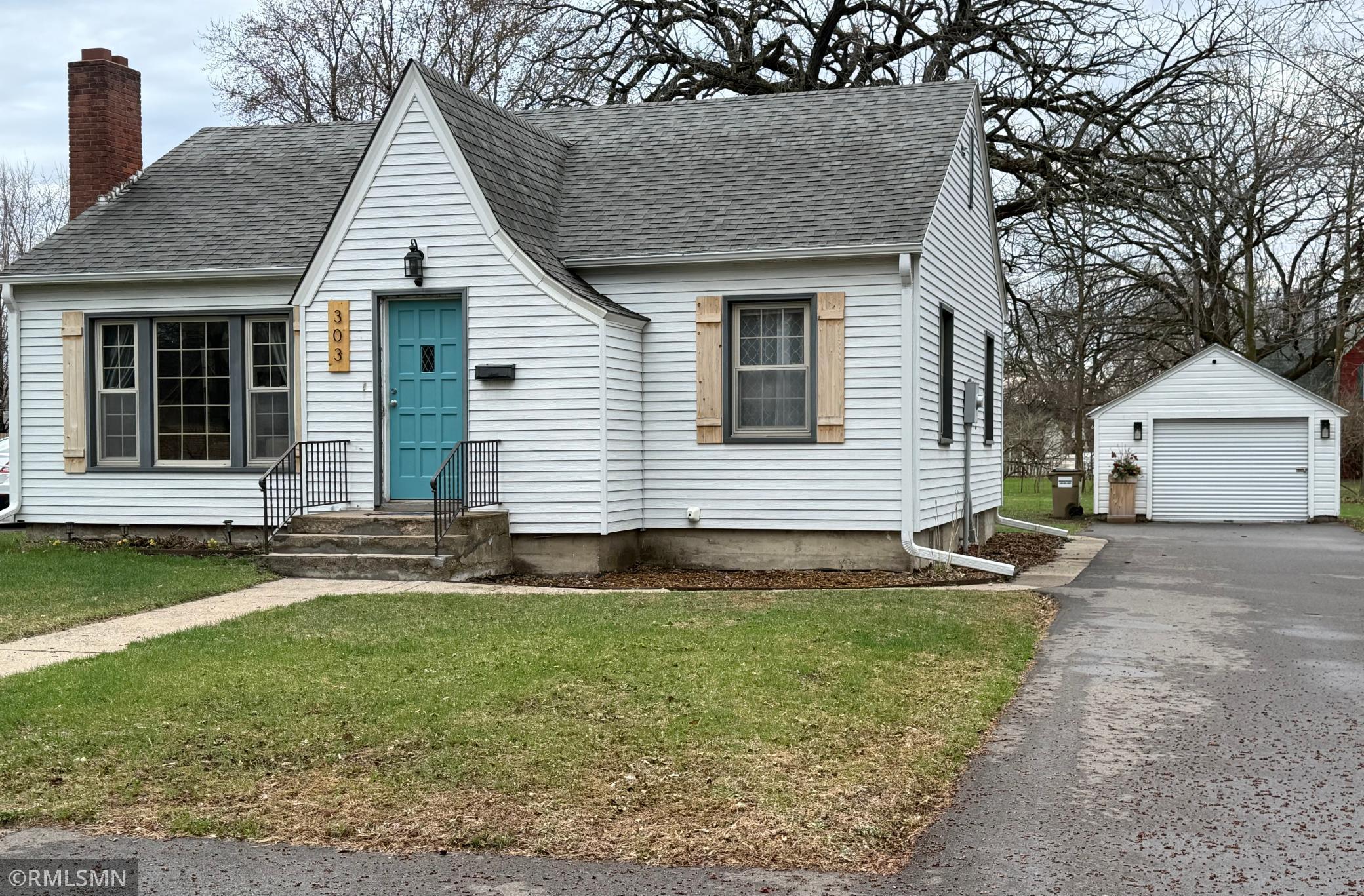 ThIs adorable Home has a great yard, some mature trees and a detached single car garage.