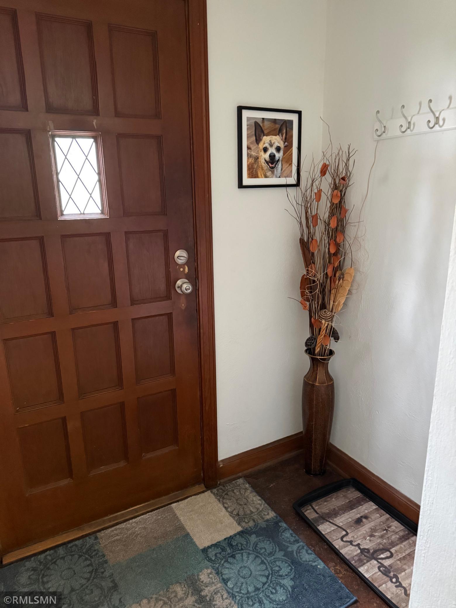 Beautiful entry door and original wood work throughout!