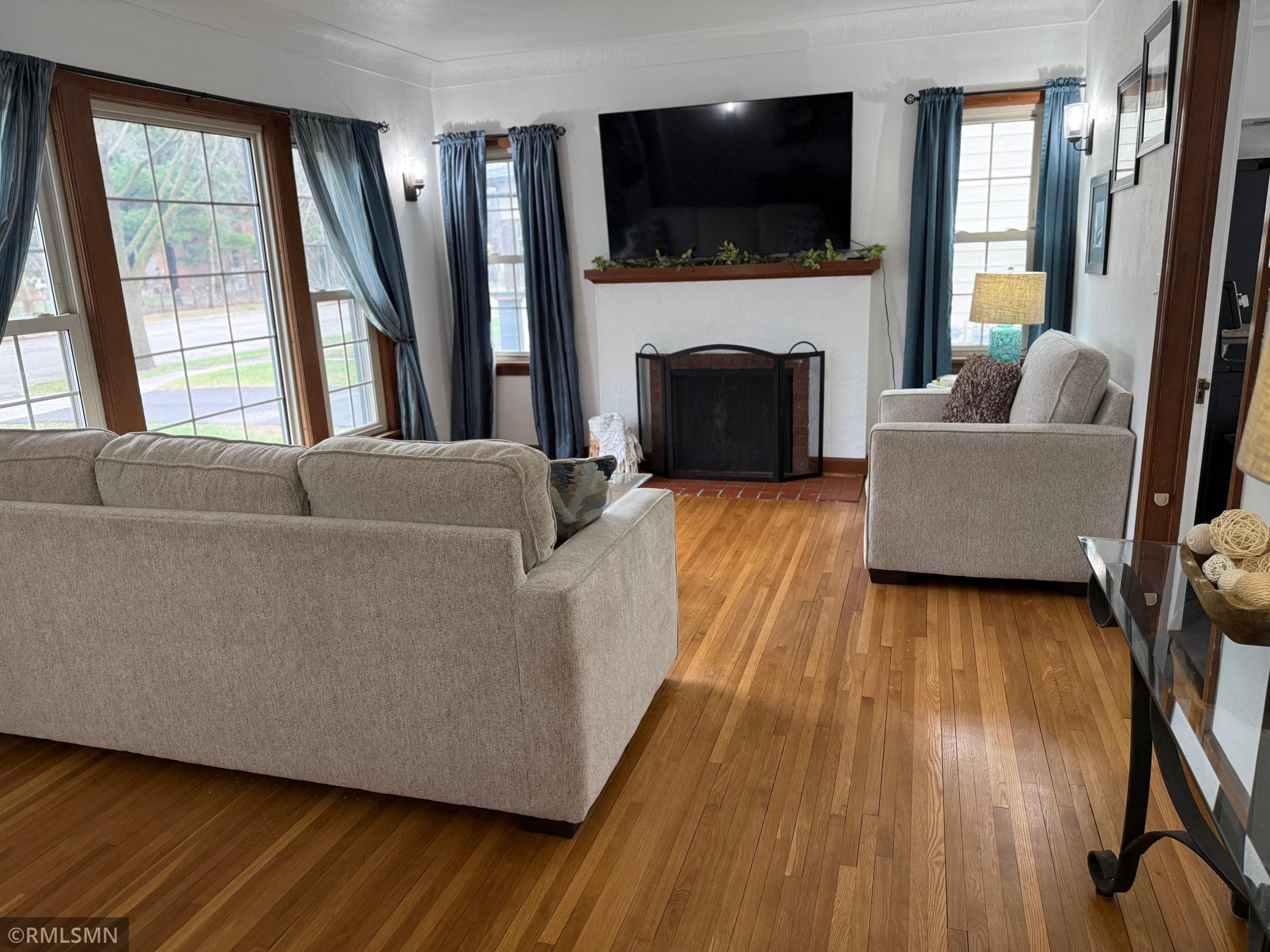 This living room also is filled with windows for lots of natural light