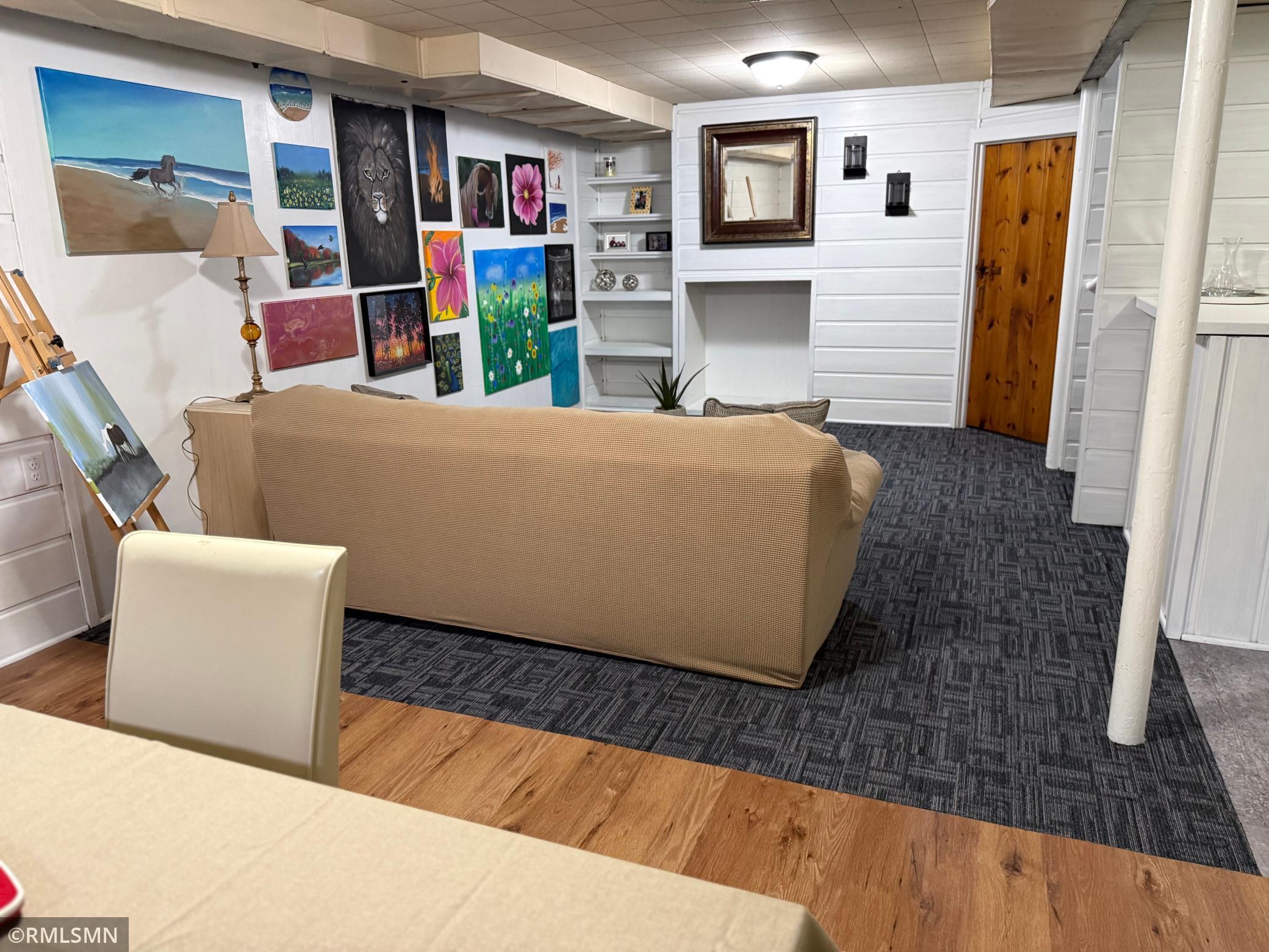 Spacious and versatile this finished lower level offers a perfect extension of your living space designed for comfort and functionality the large family room plate. It’s plenty of room for relaxing, entertaining or hosting movie nights.