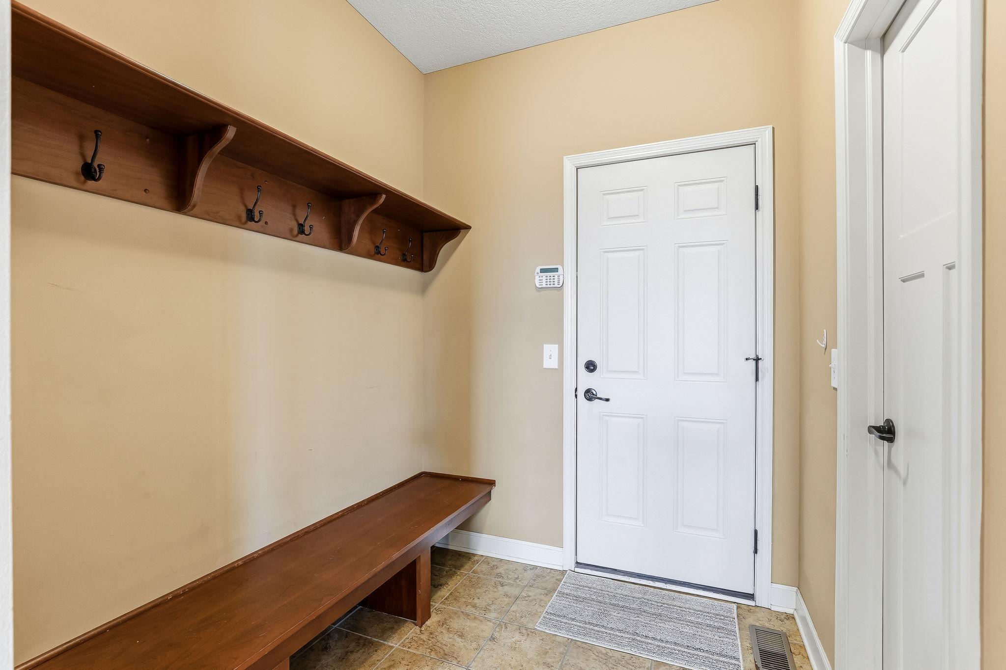 Mud room with sitting bench
